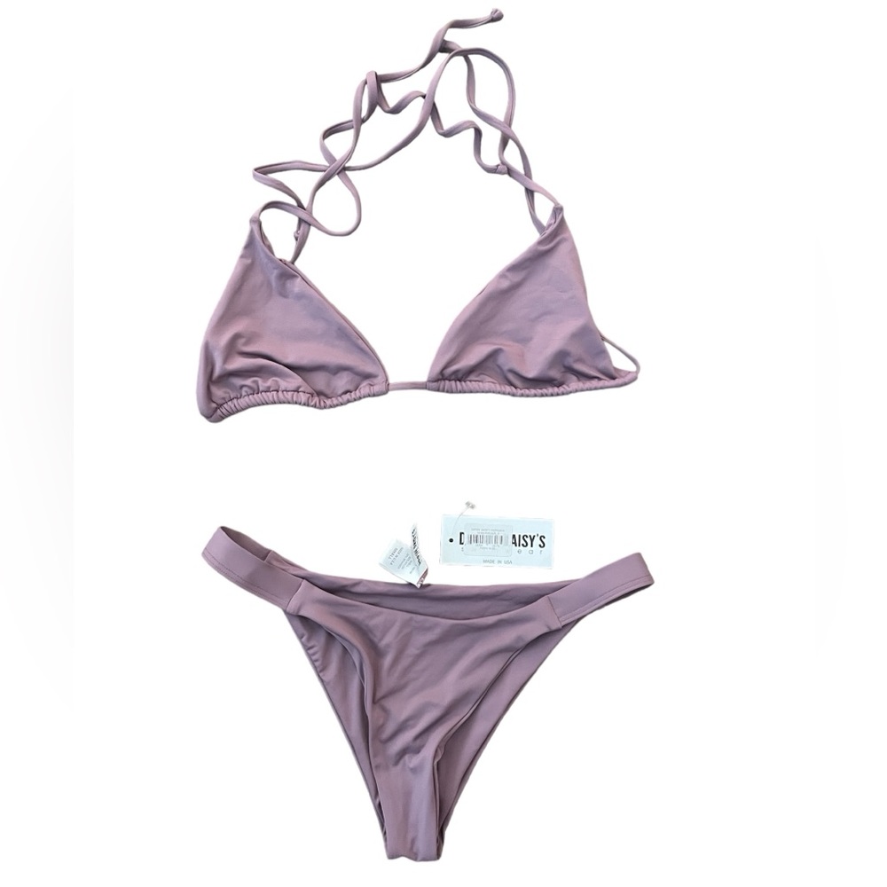 Dippin’ Daisy’s Bikini sz medium top, sz small bottoms. Brand new never worn.